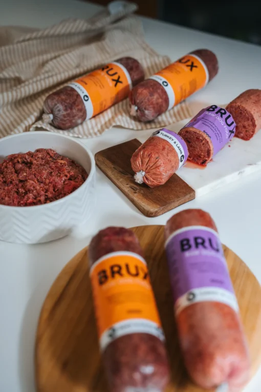brux raw food tubes with dog food bowl