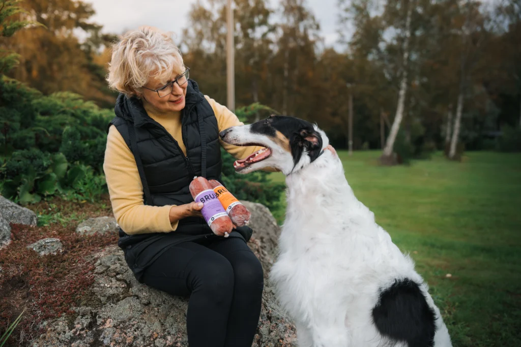 Owner with borzoi dog and BRUX raw food